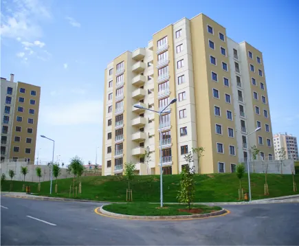 Completed modern apartment building with landscaped grounds